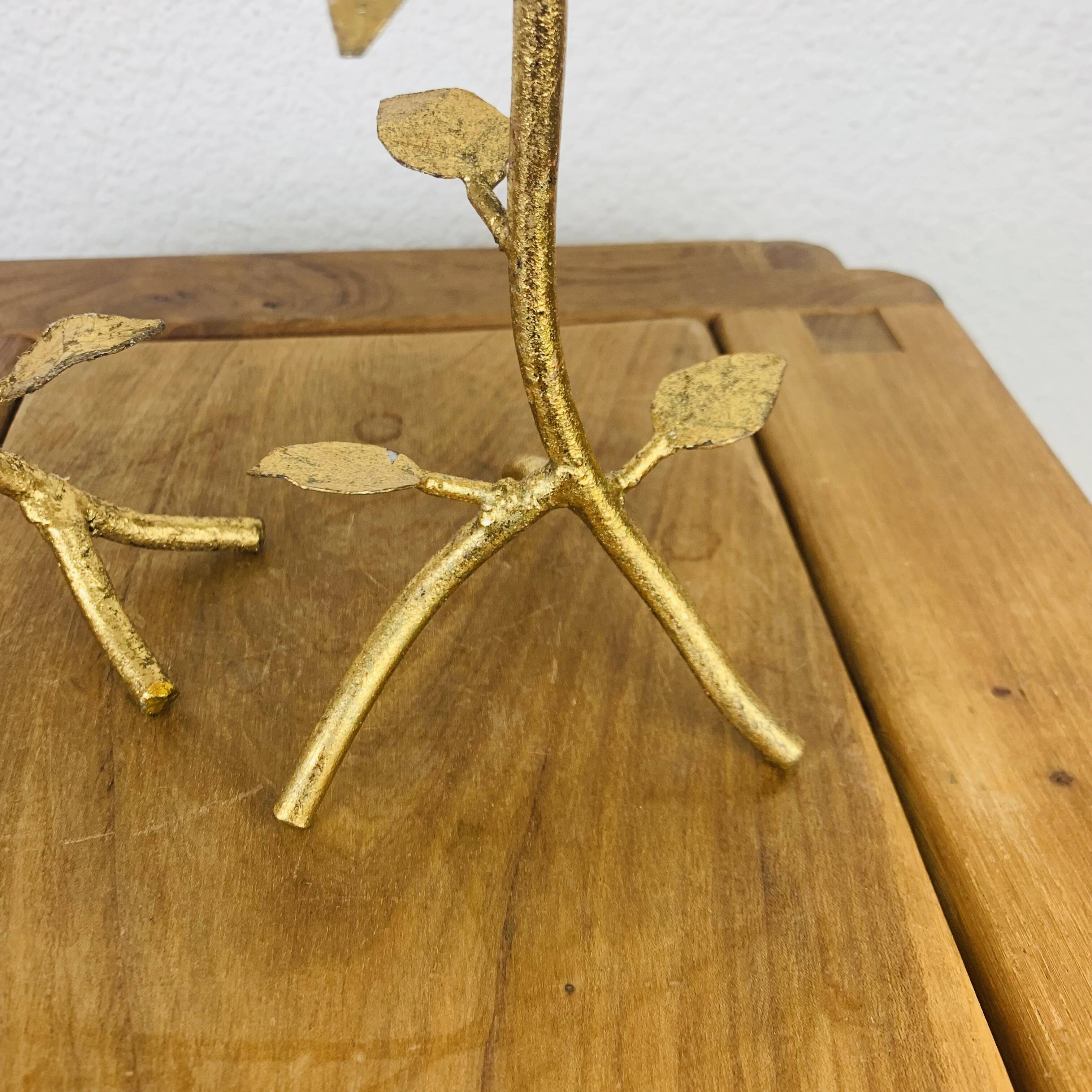 Pair of golden foliage candlesticks