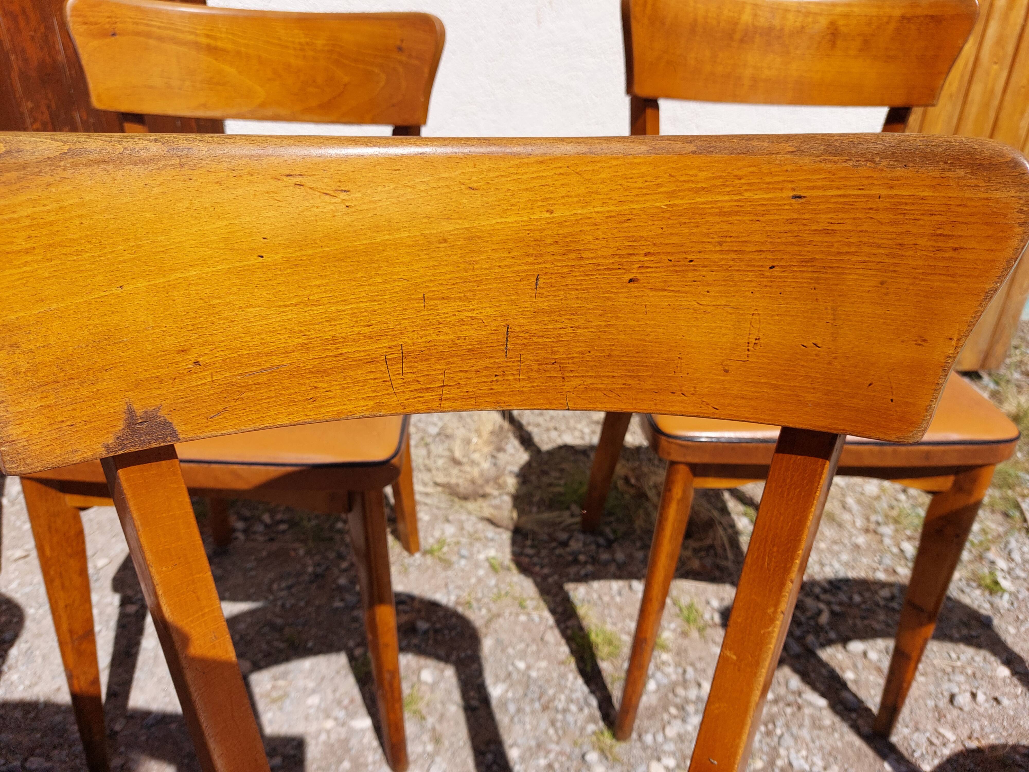 6 vintage 1960s wooden bistro chairs with camel faux leather.