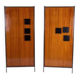 Pair of mahogany veneer and black lacquered iron cabinets. 1950s.