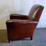 Club armchairs with curved backs
