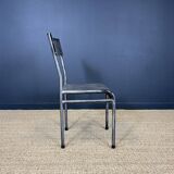 Pair of gray metal industrial chairs