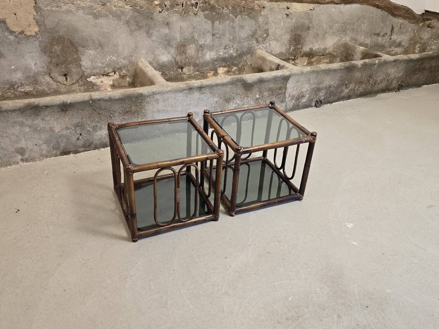 Two rattan and smoked glass tables, 1970