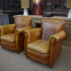 Paire de fauteuils club vintage en cuir