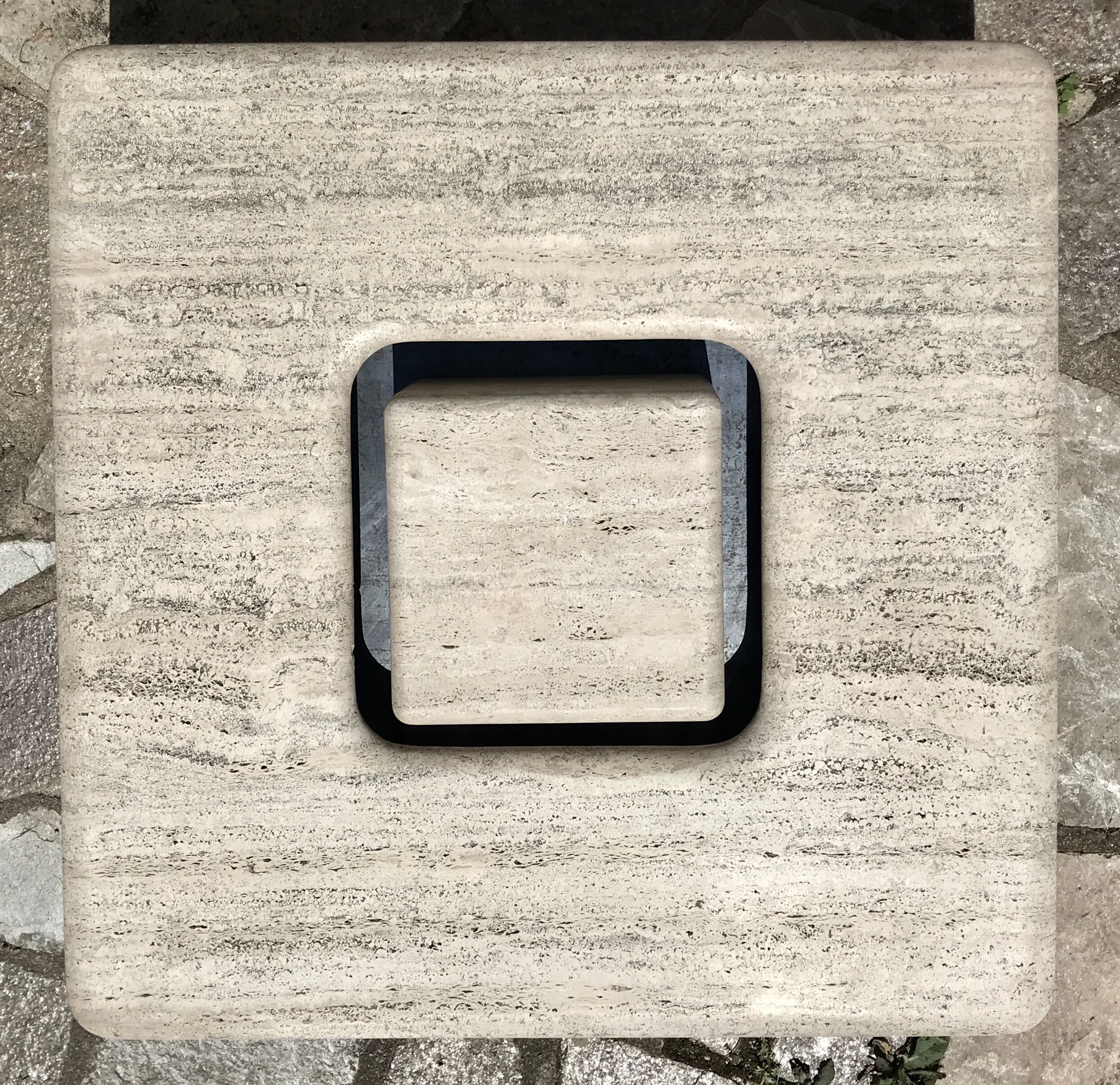 Sculptural travertine coffee table