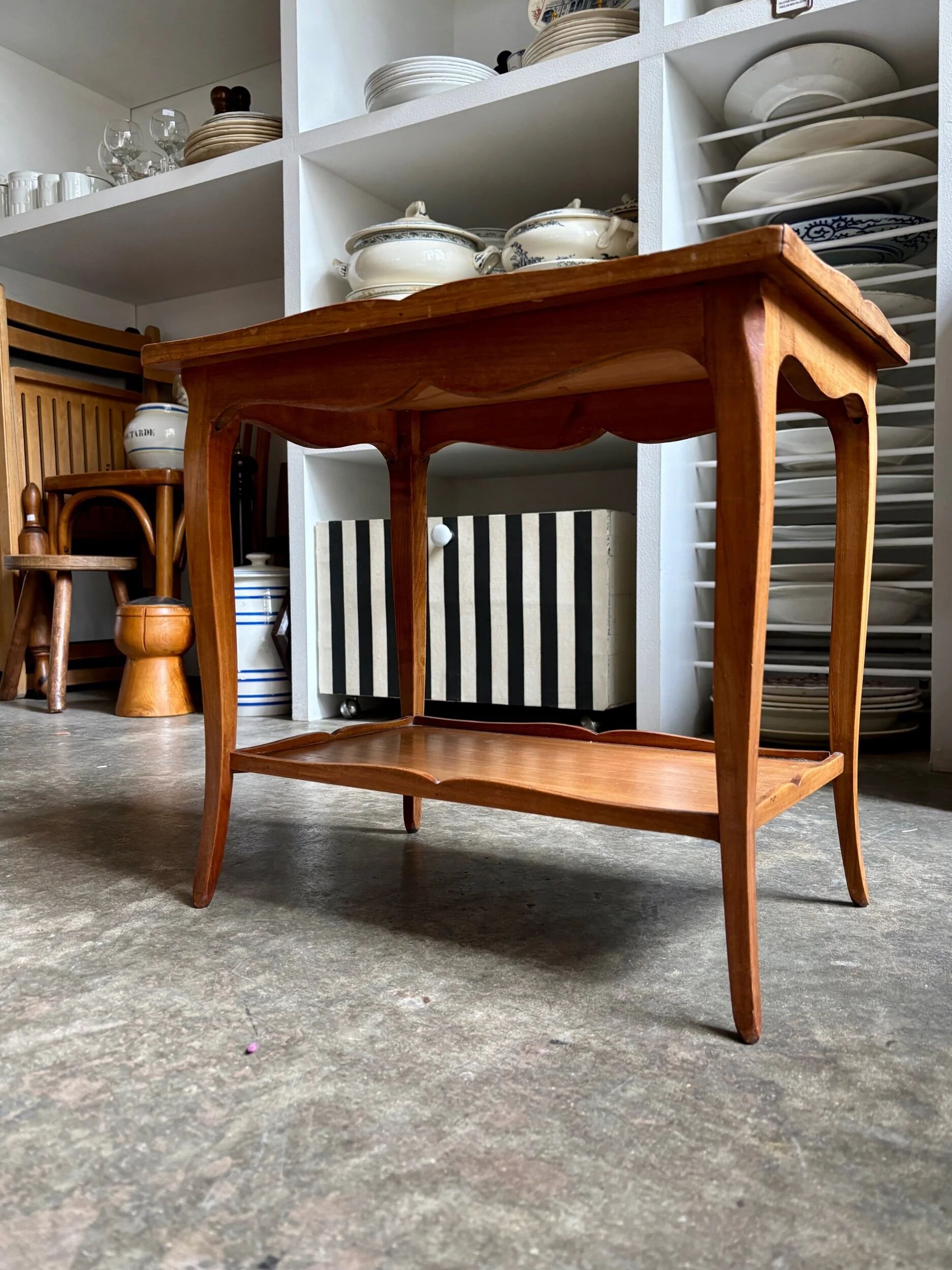 Coffee table, side table in light wood with saber legs.
