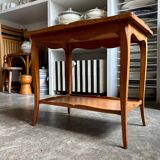 Coffee table, side table in light wood with saber legs.