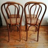 Series of 4 cane bistro chairs