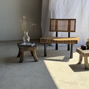 Small stool, rectangular solid teak side table with curved legs.