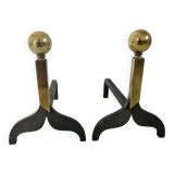 Pair of modernist steel and brass andirons