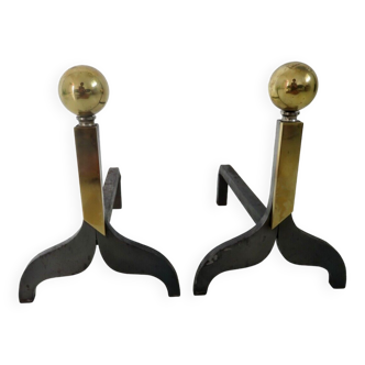 Pair of modernist steel and brass andirons