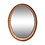 Oval mirror with woven rattan frame 63x47