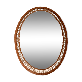 Oval mirror with woven rattan frame 63x47