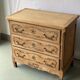 Vintage Louis XV chest of drawers renovated in raw and carved wood