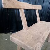 Old small farm bench in solid oak