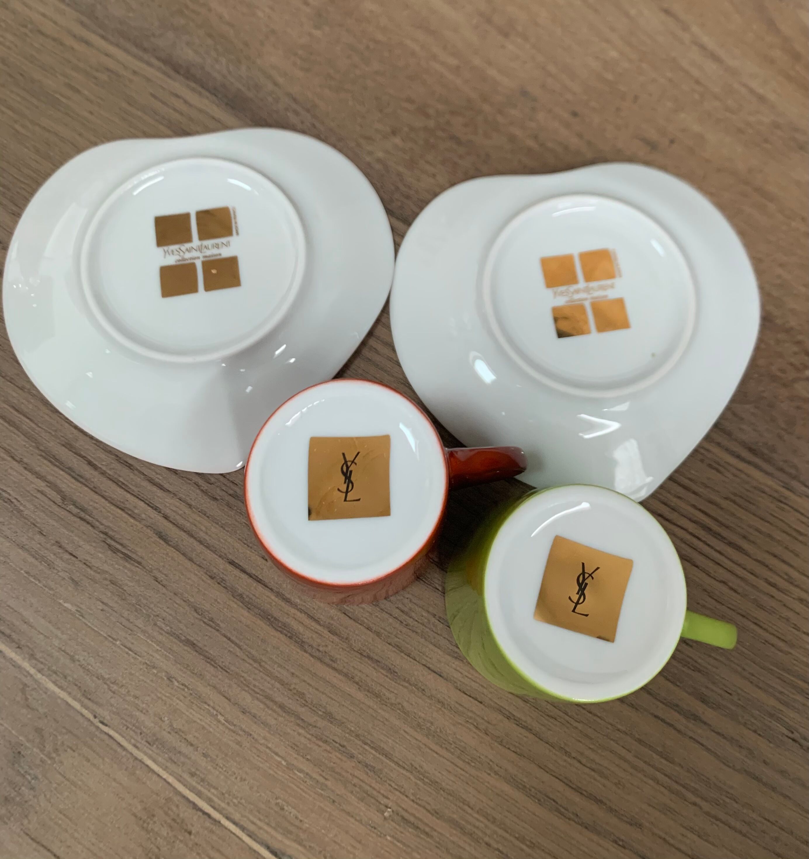 Two cups and saucers in porcelaine Yves Saint Laurent