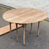 Renovated Louis Philippe round extendable dining table with leaves from the 18th century.