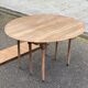 Renovated Louis Philippe round extendable dining table with leaves from the 18th century.