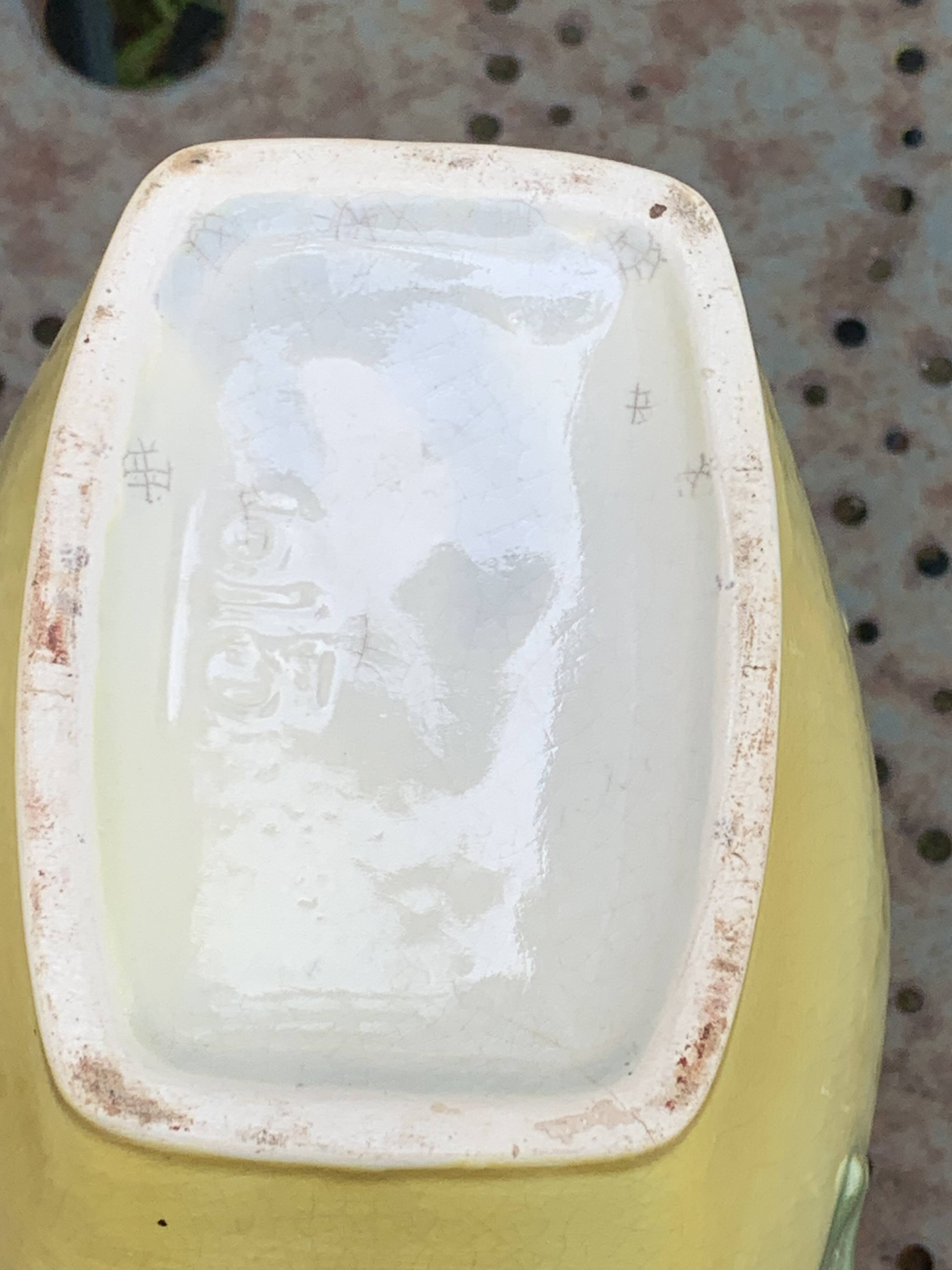 Yellow glazed ceramic slip vase with hawthorn pink flower motif