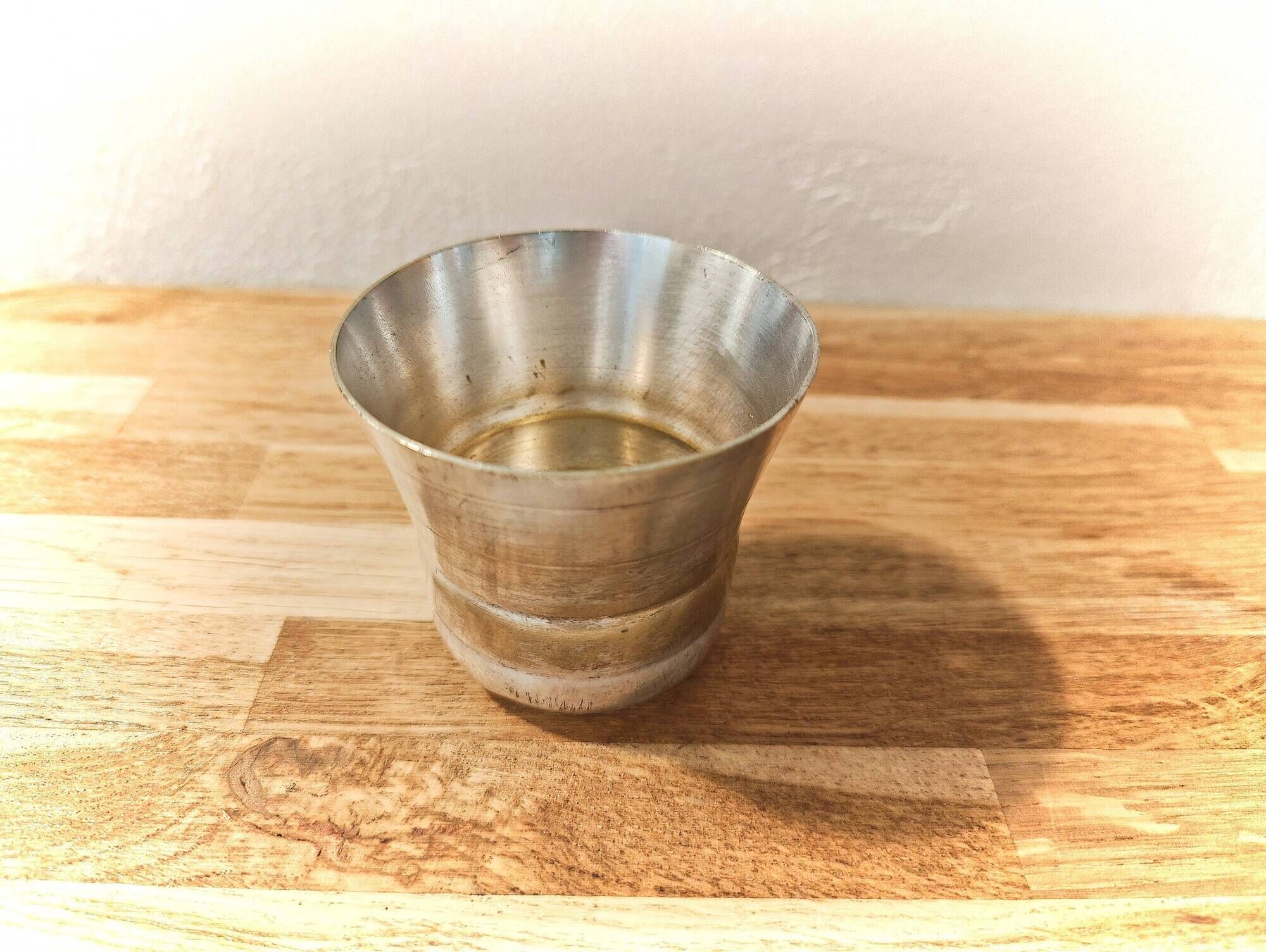 Antique timbale in silvered metal