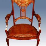 19th century armchair in leather and rosewood inlaid with brass and rosewood