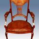 19th century armchair in leather and rosewood inlaid with brass and rosewood