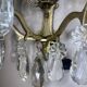 19th-century wall sconce, bronze and crystal pendants.