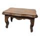 Antique footstool with rustic charm