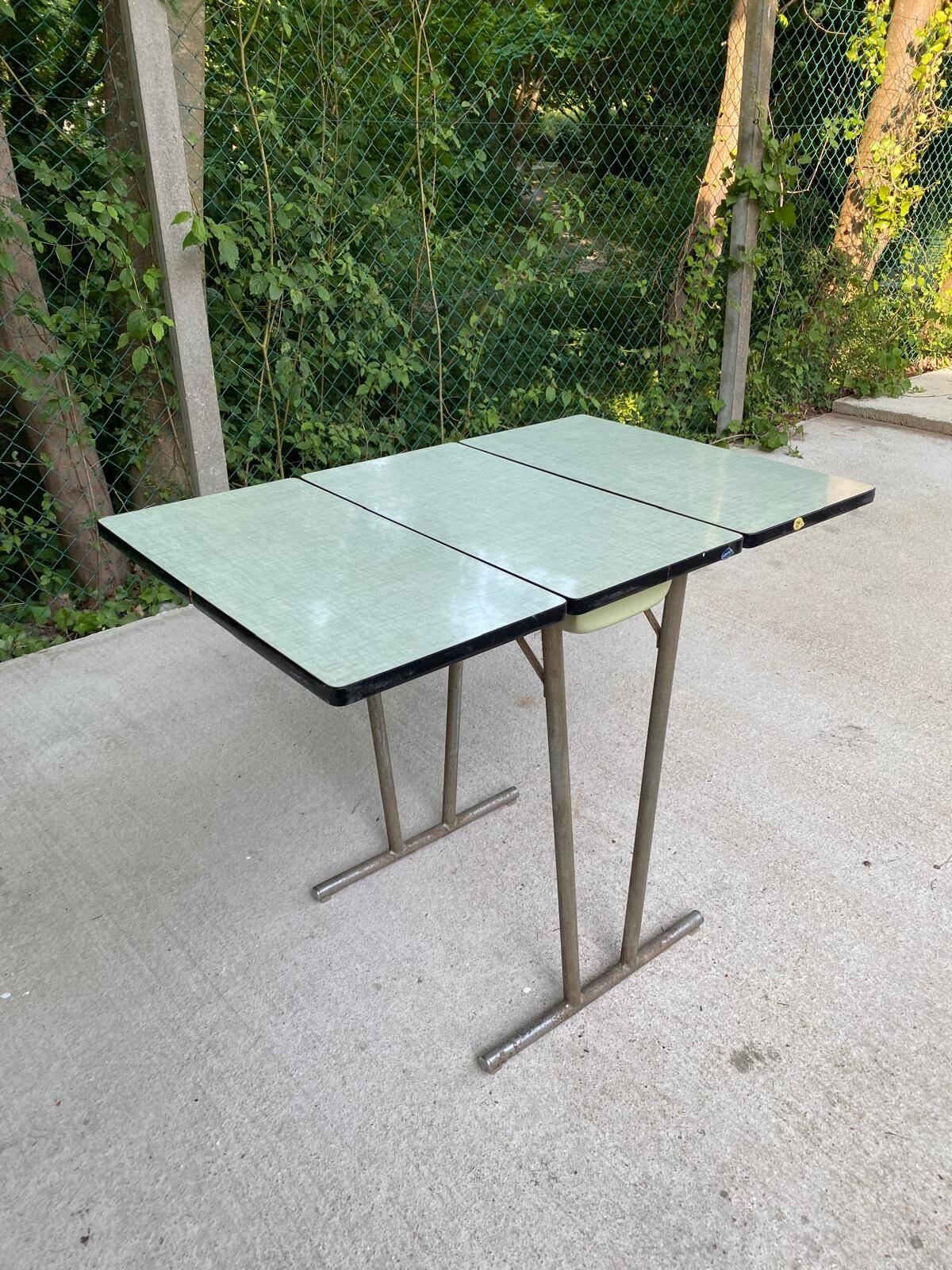 Folding and extending kitchen table in steel and aqua green wood
