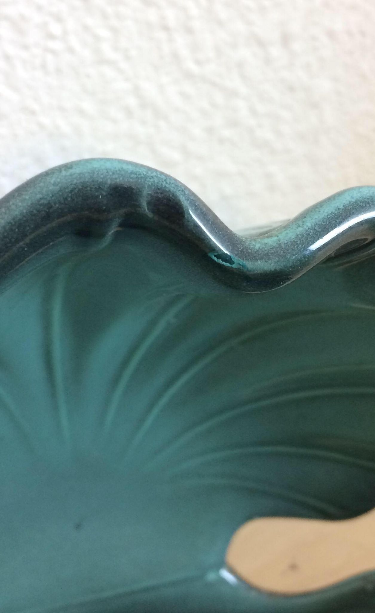 Empty pocket blue ceramic shell