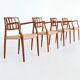 Niels Otto Moller model 66 armchairs teak and paper cord Denmark 1974