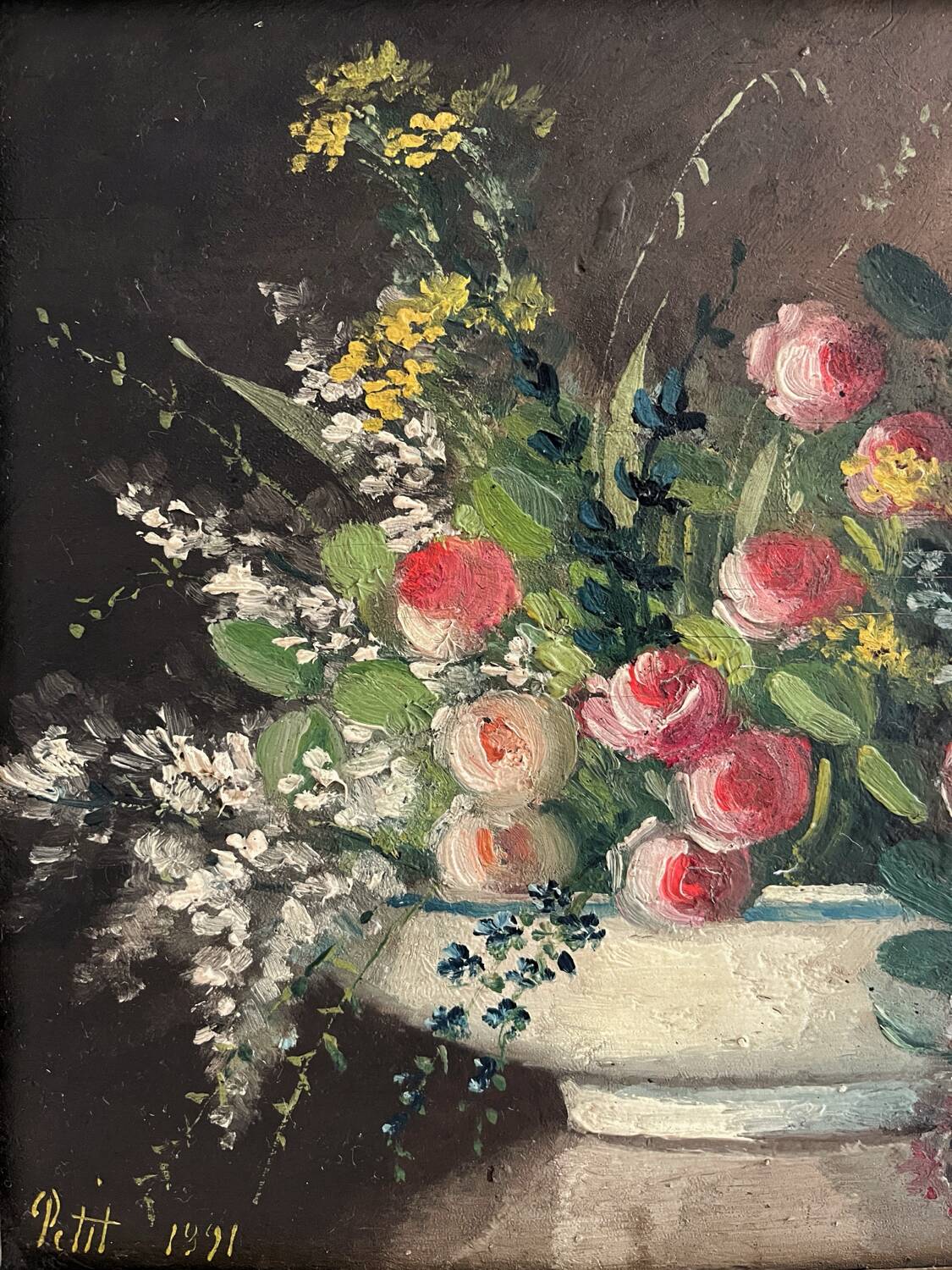 Old oil painting on wood of a bouquet of flowers signed Petit.