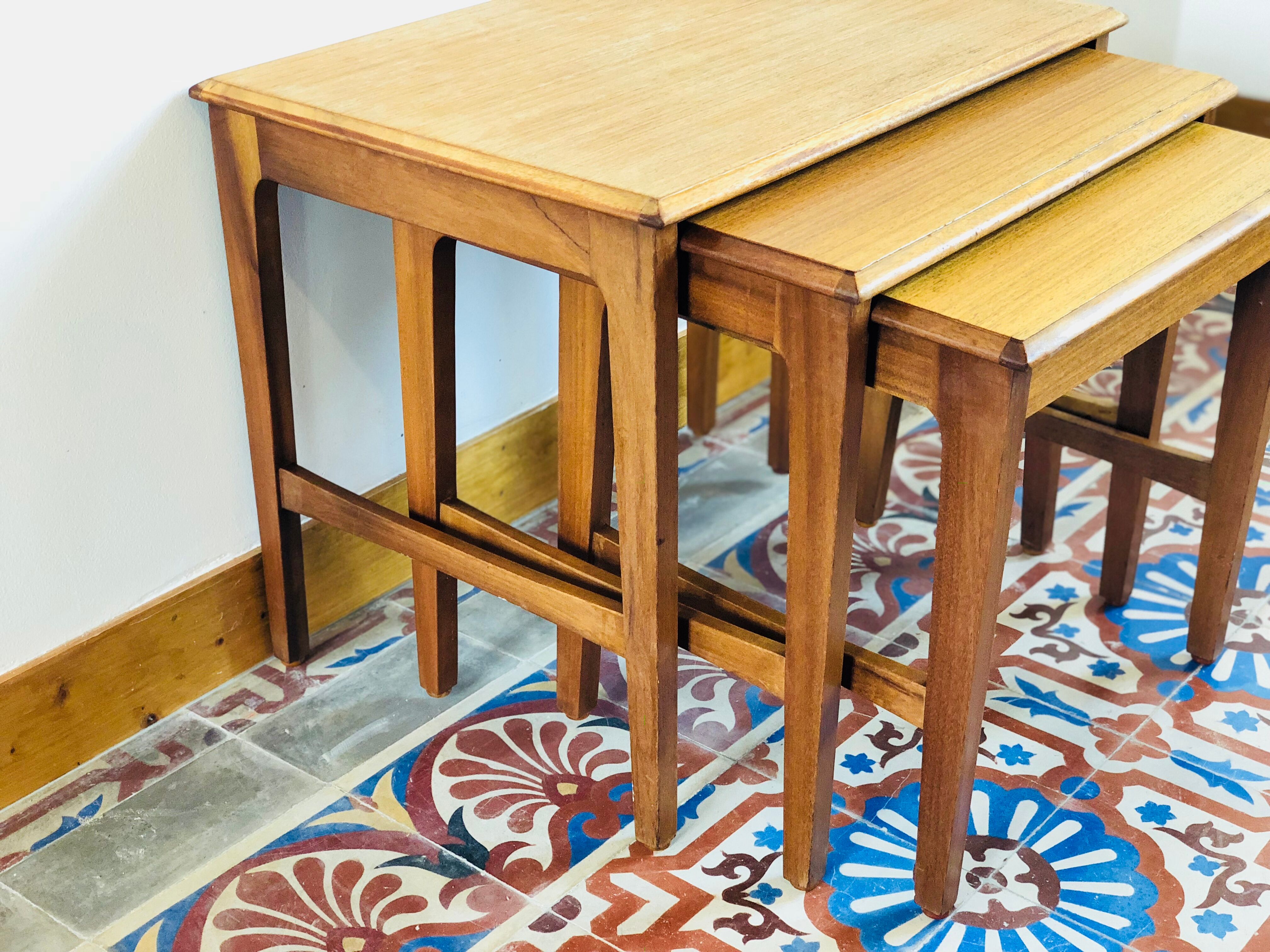 Pull-out tables teak by Remploy