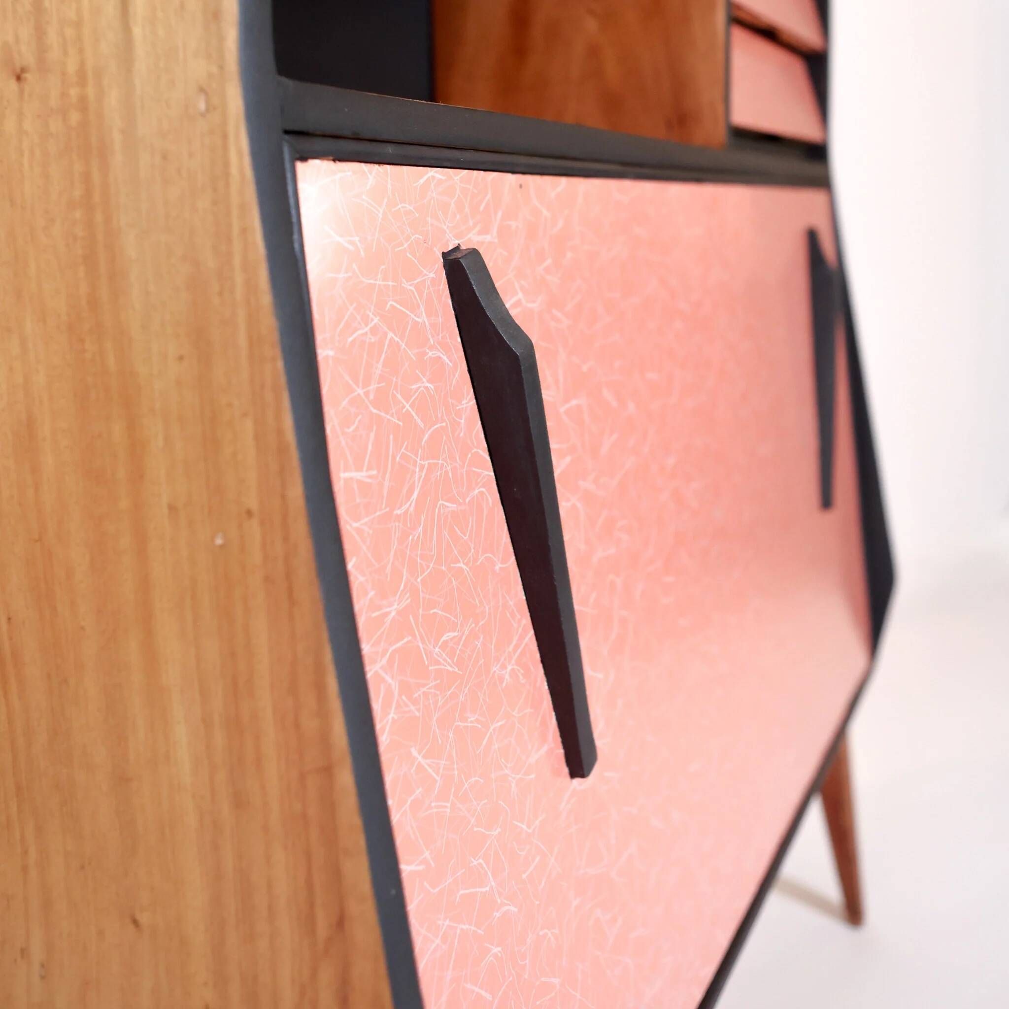 Vintage retro wooden storage furniture with salmon-coral accents and tapered legs, 1950s.