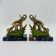 Art Deco bookends with elephants in brass and marble.