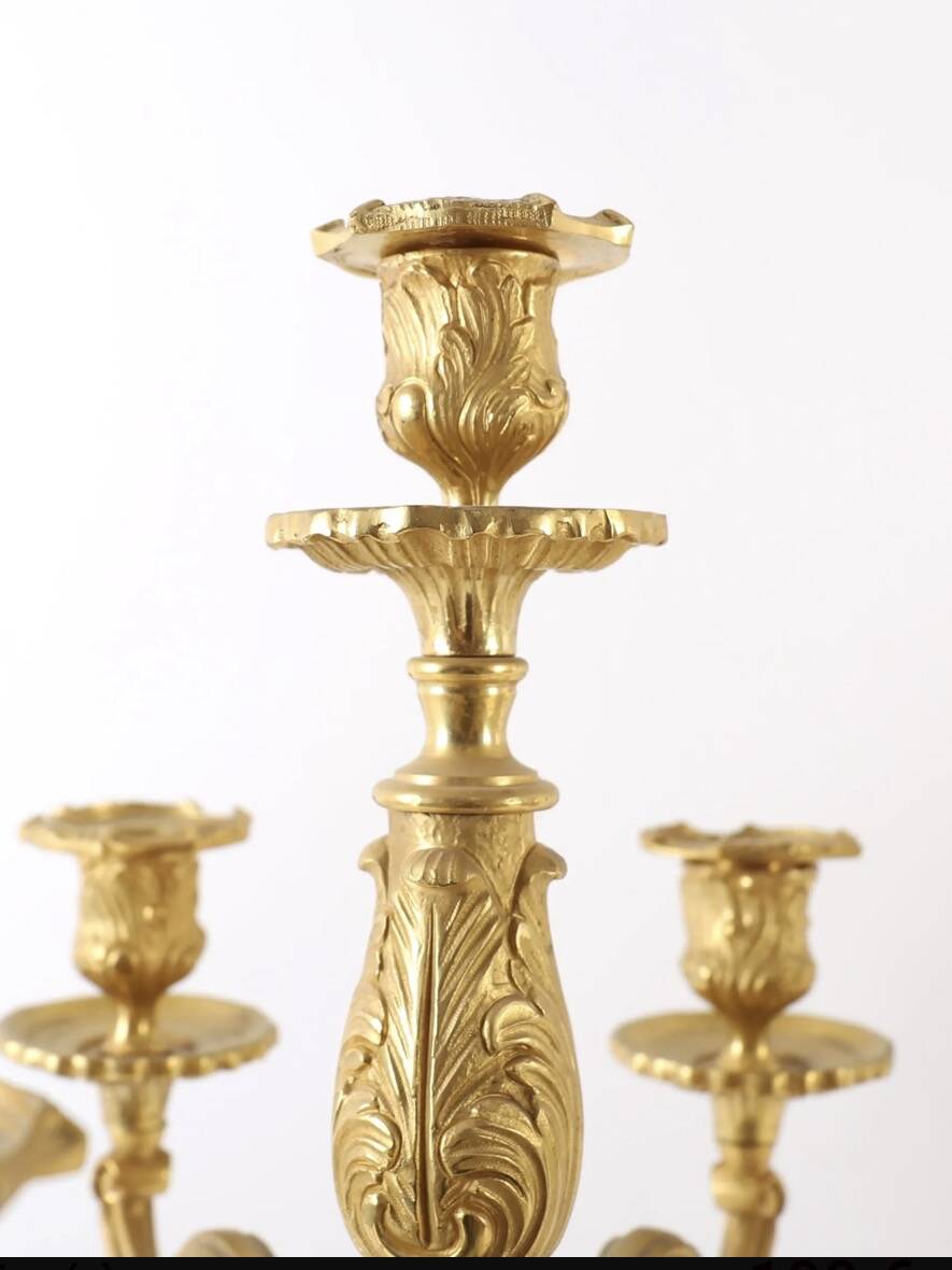 Pair of candelabra, in Louis XV style, in gilded bronze.