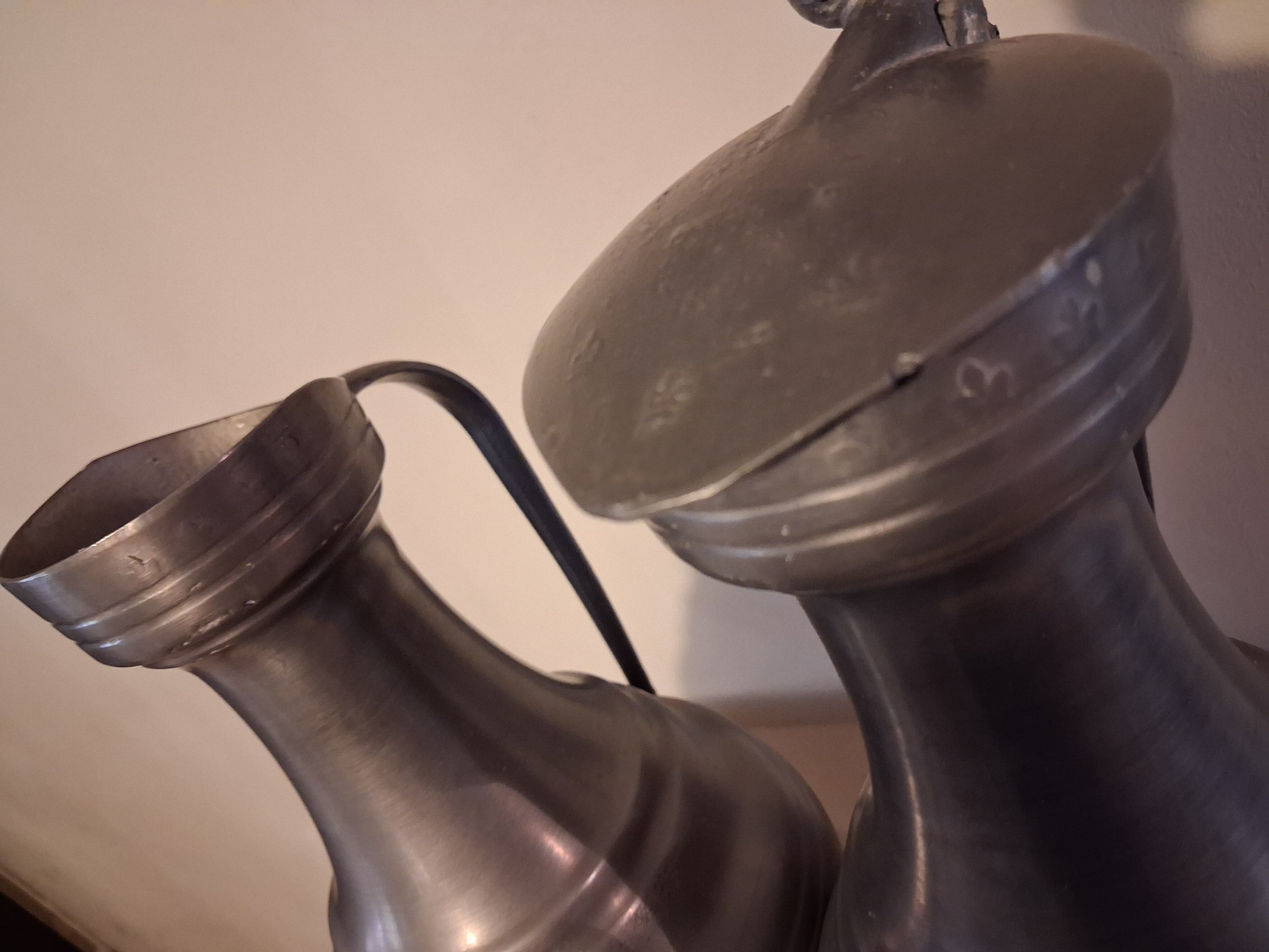 Large vintage pewter jugs