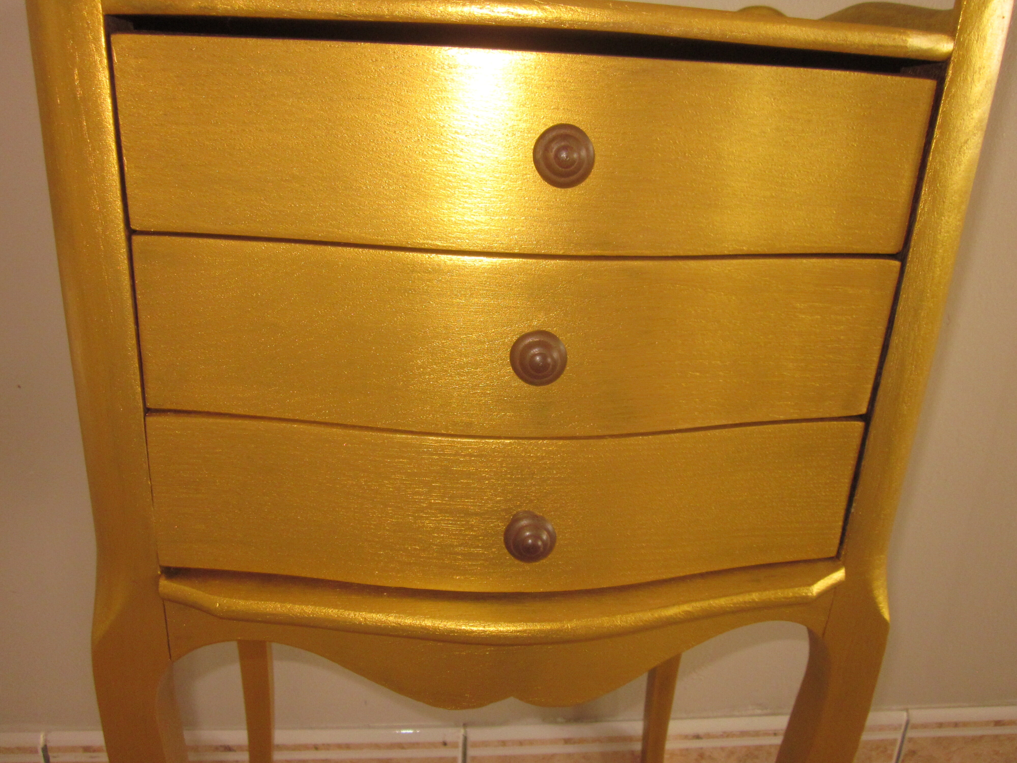 Gilded wooden bedside