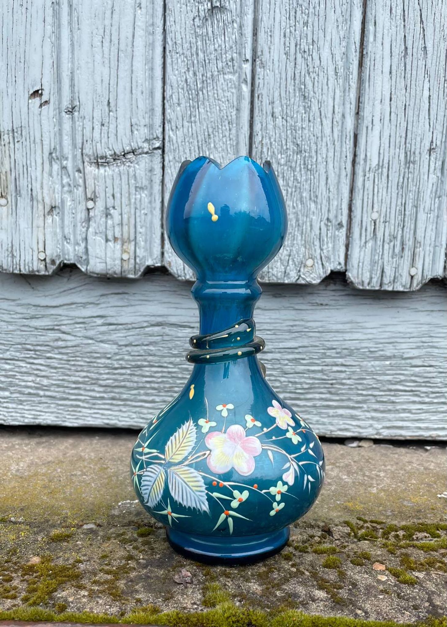 vintage vase painted in satin blue