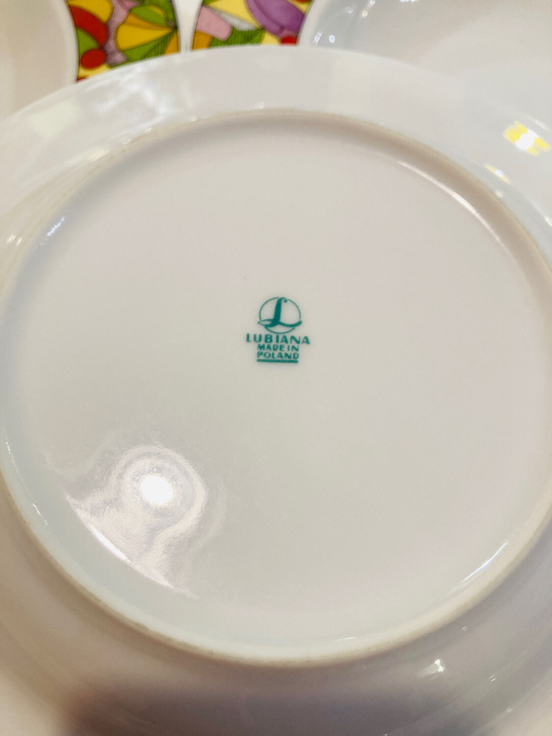 4 hollow porcelain plates pattern multico Lubiana