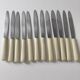 Set of 12 stainless steel and bakelite knives