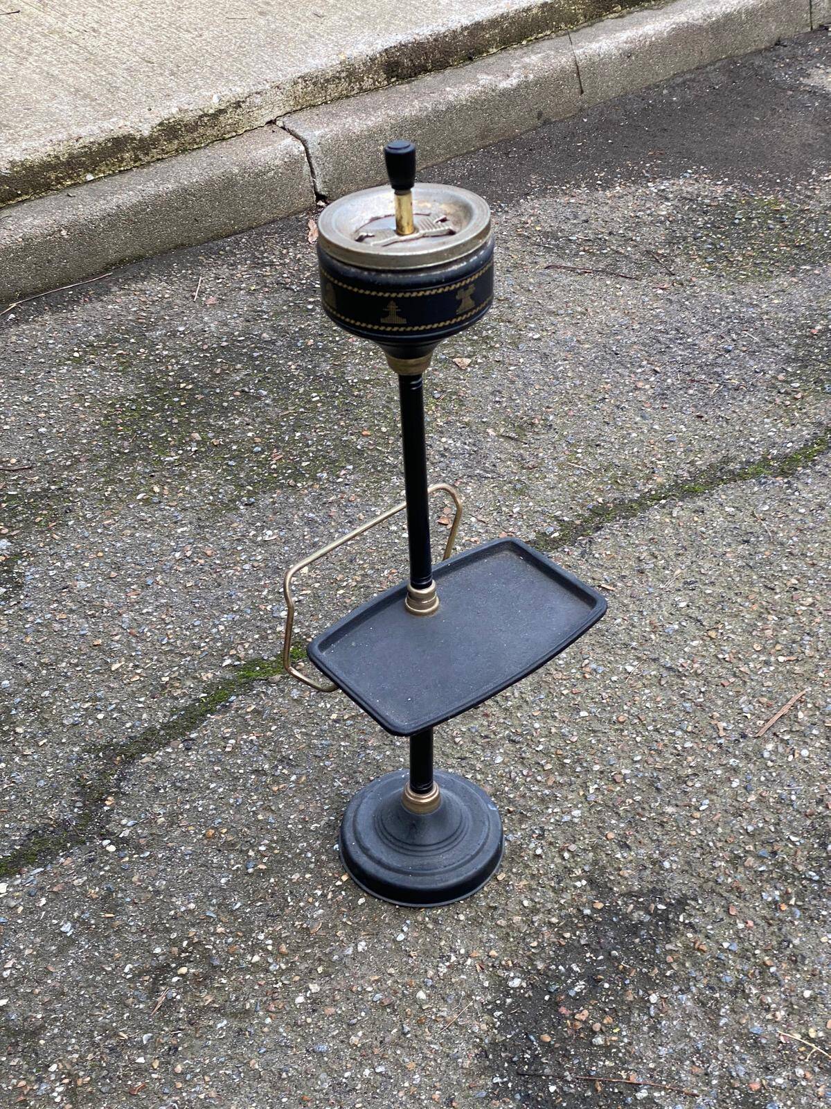 Vintage ashtray on a stand with a magazine holder from the 1960s.