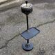 Vintage ashtray on a stand with a magazine holder from the 1960s.