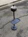 Vintage ashtray on a stand with a magazine holder from the 1960s.
