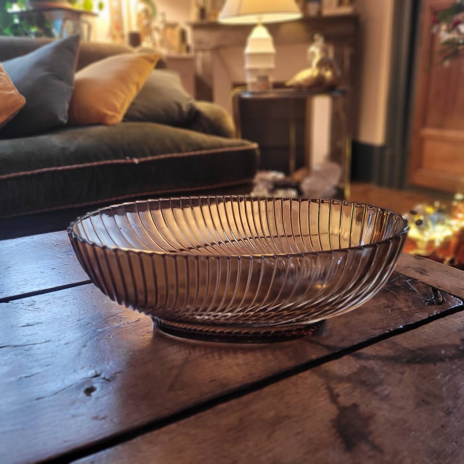 Smoked glass bowl with a radiating embossed pattern — 1970s