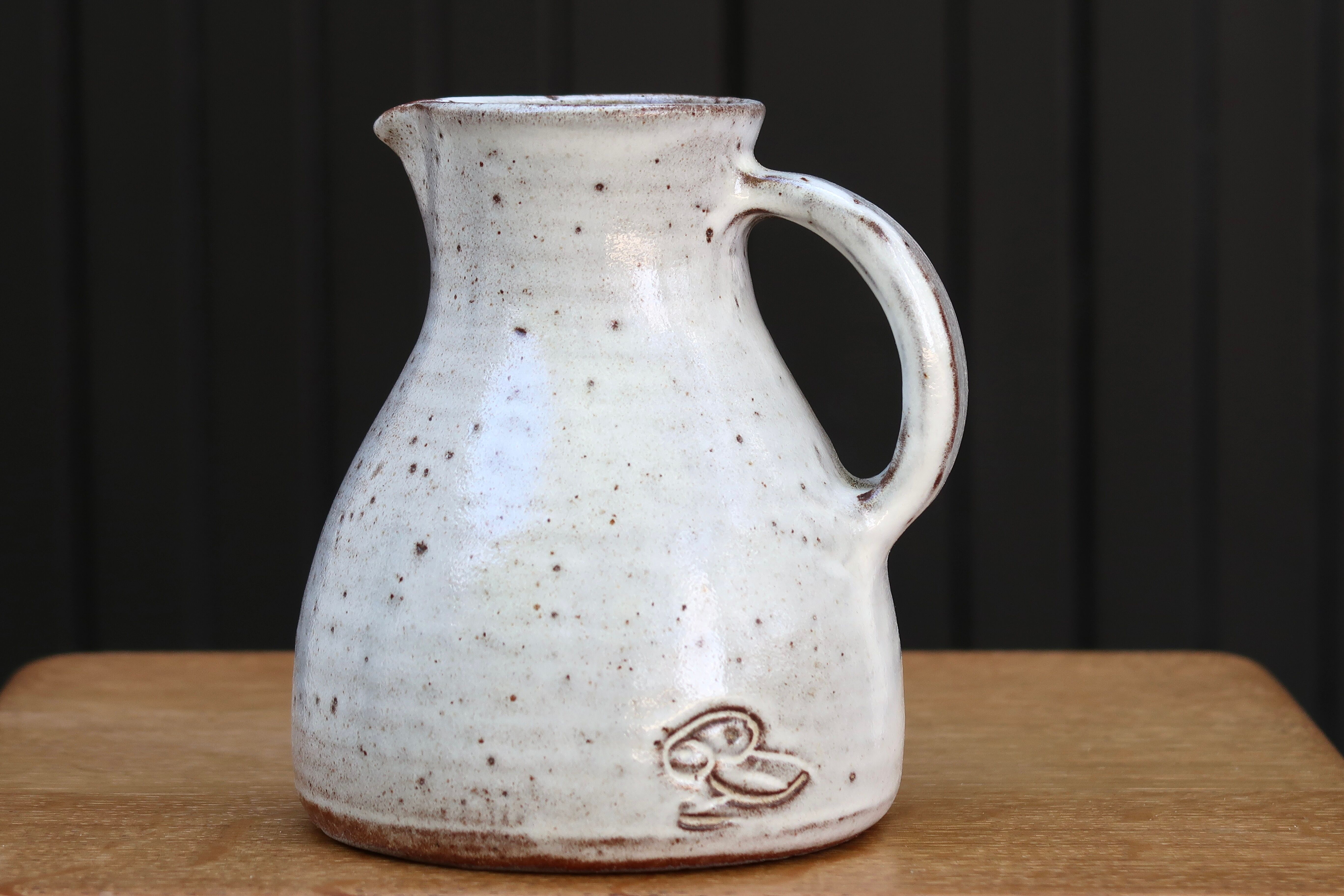 Sandstone pitcher by Jeanne and Norbert Pierlot, 60s