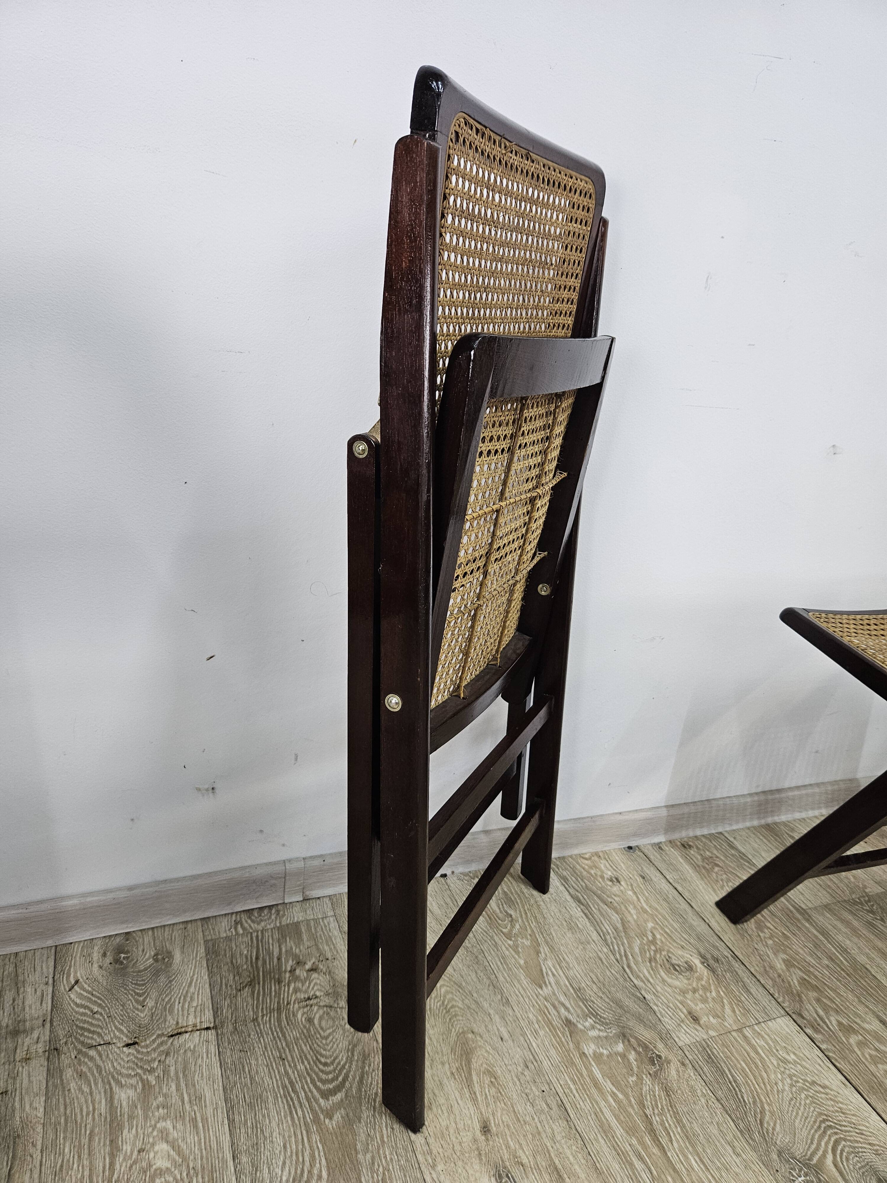 Folding wooden chairs with raffia, 1970s.