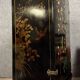 Chinese cabinet in black lacquer and colored decorations