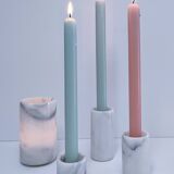 Four white marble candlesticks with black veins, 70s design