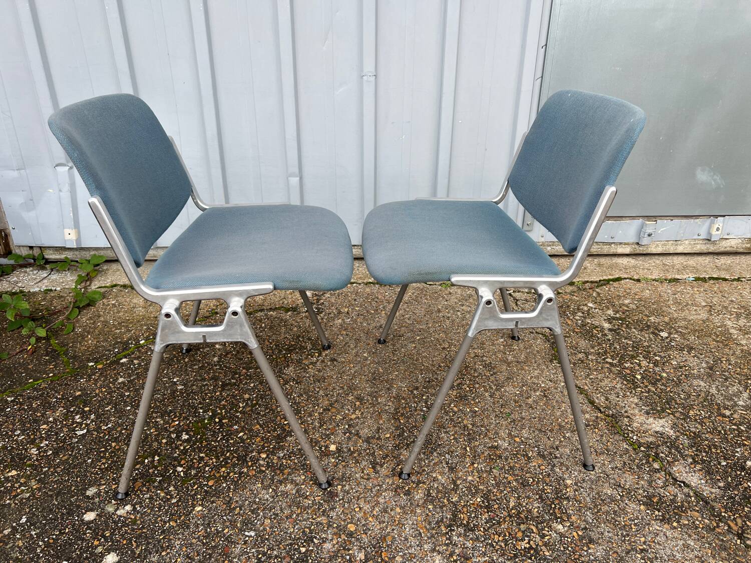Pair of chairs by G. Piretti for Castelli