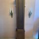 Walnut showcase, grooved uprights, 4 glass shelves
